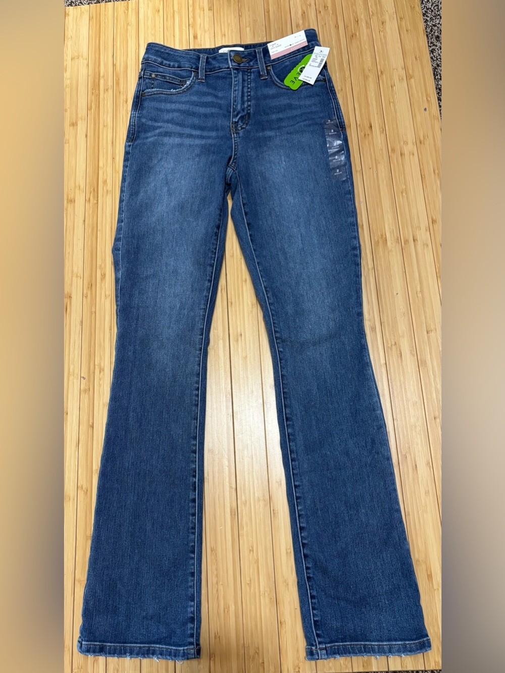 Everflex high rise slim boot cut jeans. NWT. Size 2. Medium wash. Super stretch.